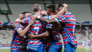 Torcedor acompanhando odds de uma partida do Fluminense antes de apostar